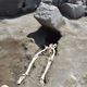 Excavations in May revealed the man’s skeleton, but not his skull.